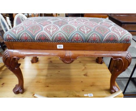 A mahogany framed stool on cabriole legs with upholstered seat