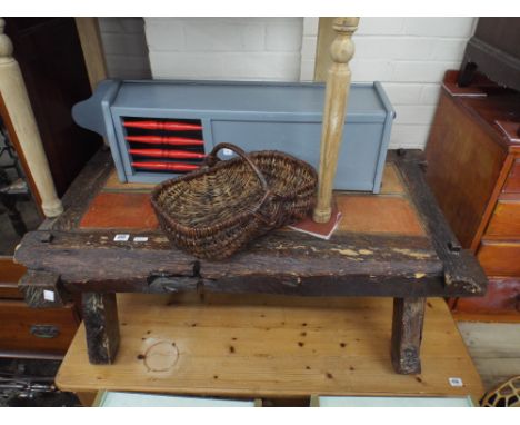 A rustic tile top coffee table, a French stick cabinet and a basket 