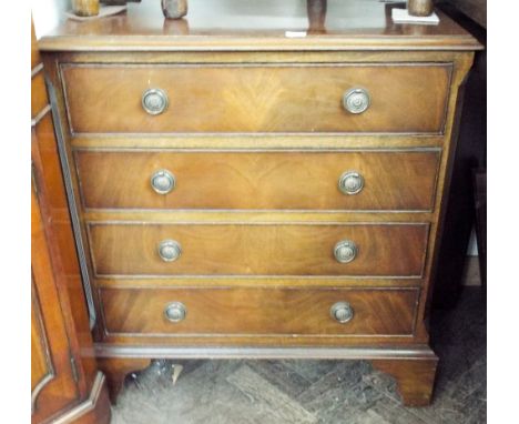 A reproduction mahogany four drawer chest of drawers standing on bracket feet, overall dimensions 80cms x 75cms 