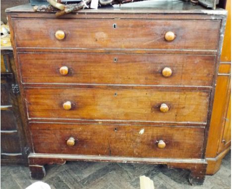 A mahogany graduated four drawer chest with turned bun handles standing on bracket feet, 105cms high 107cms wide 