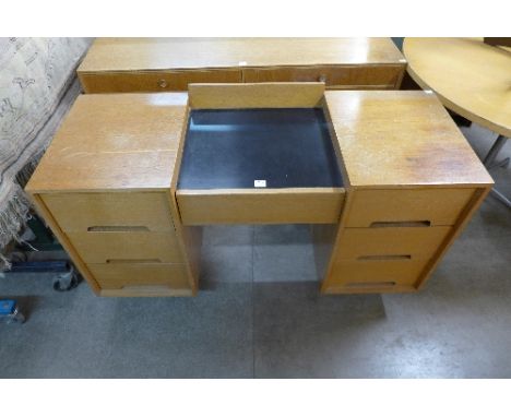 A Stag C-range light oak desk