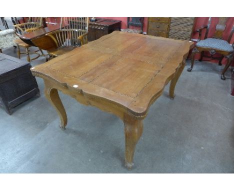 A French inlaid cherrywood draw-leaf dining table