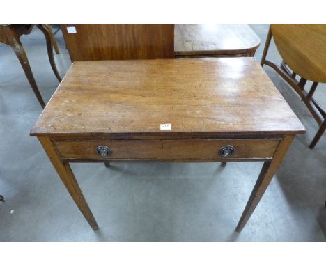 A George III mahogany side table with a single frieze drawer on square tapering supports