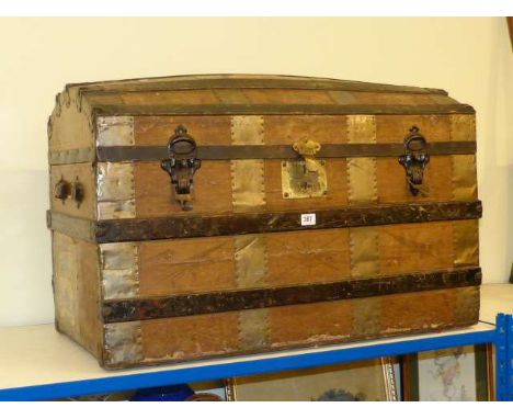 Vintage metal and wood bound dome topped cabin trunk