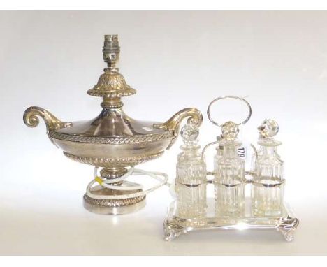 Silver plated six bottle cruet and a white-metal table lamp (2)