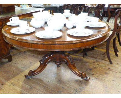 Victorian circular rosewood loo table raised on carved pedestal tripod base