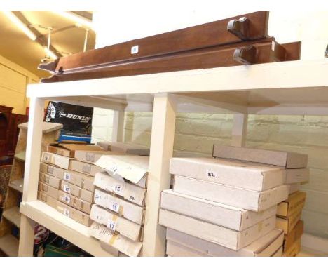 Collection of over fifty boxed collectors plates together with two wall mountable display racks