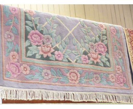 Mauve ground floral decorated Chinese carpet 2.50 x 1.52