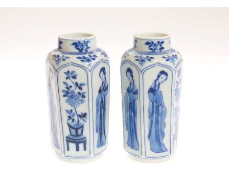 Pair of Chinese octagonal blue and white vases, each panel painted with figures or flowers, 16cm high