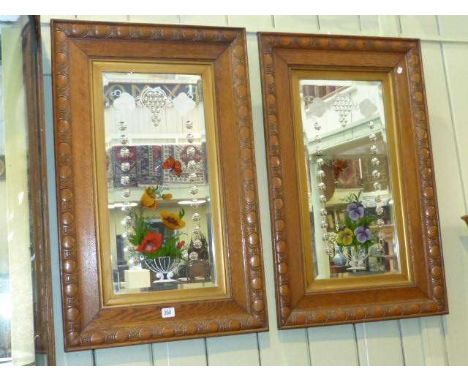 Pair of early 20th Century oak framed mirrors with decorated plates