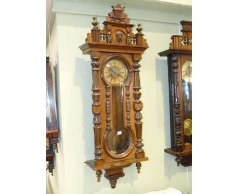 Victorian walnut cased Vienna wall clock having keyhole glazed panel door