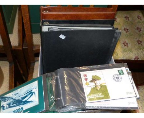 Four albums of first day covers