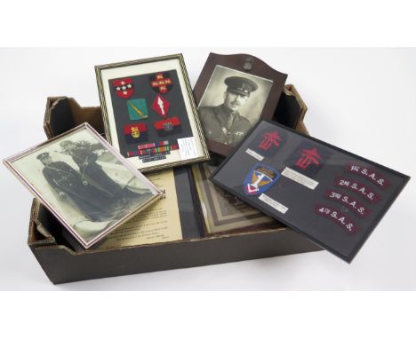 Banana box of Militaria interest, inc pictures and army corps badges, buyer collects