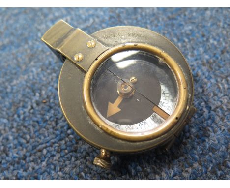 WW1 1915 dated pocket compass in 1918 dated leather case.