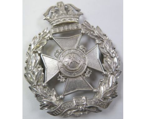 Queens Irish Regiment Helmet plate ? converted to a pouch badge ?