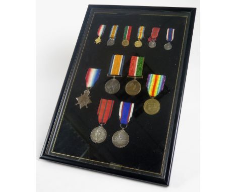 Framed group to 196635 George Edward Marshall LS RN. 1915 Star Trio, Mercantile Marine Medal, GV RNVR LSGCM, and 1911 Metropo