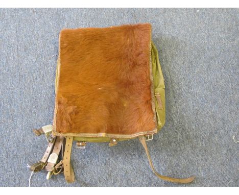 German WW2 army fur back pack complete with leather straps   