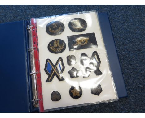 British Army bullion trade badges in ring binder ( 42 items)