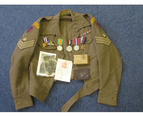 WW2 1940 pattern Royal Armed Corps battle dress blouse complete with insignia div patches dated 1945 comes with his F&G group