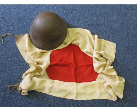 Japanese late WW2 helmet with Japanese WW2 flag   