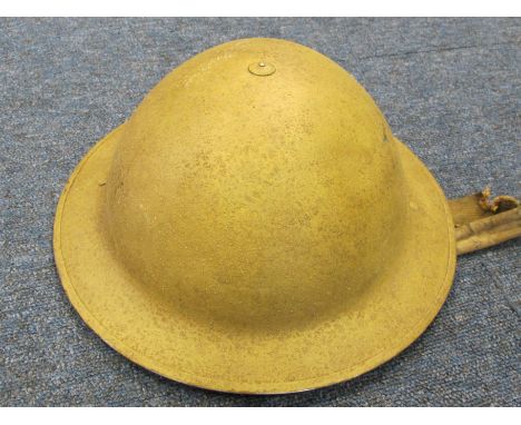 Desert Rats a scarce desert finish Tommies tin helmet complete with liner and fabric chin strap, VF