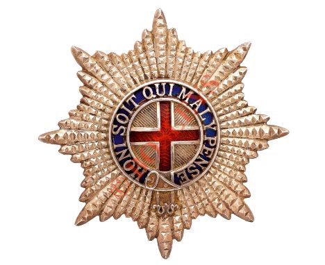 Coldstream Guards Warrant Officer’s cap star. A fine cut silvered example; the Garter pierced with blue enamel ground, centra
