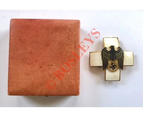 German Third Reich Cased Red Cross Decoration 2nd Class. by LDO A good scarce pinback breast badge in gilt and enamels circa 