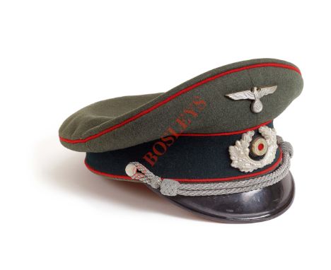 German Third Reich Army Artillery Officer’s peaked cap. A fine example of field grey woollen cloth with red piping to the wel