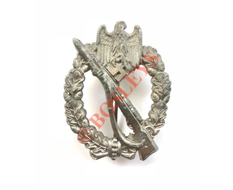 German Third Reich WW2 Army / Waffen SS Infantry Assault Badge by Walter & Henlein, Wein. A good silvered die-cast example wi