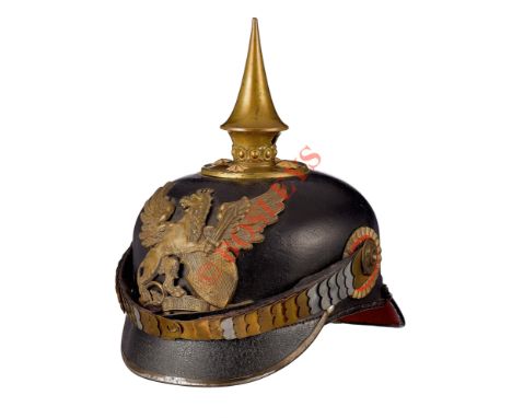 WW1 Imperial German Baden Infantry Officer’s Pickelhaube. A good late WW1 made example, the black leather skull retains a goo