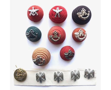 Selection of Officer’s cord bosses. 1st Gurkha red with chromed regimental device ... 8th Gurkha similar ... black cord boss 
