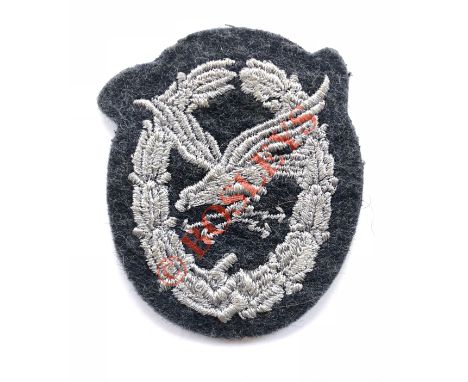 German Third Reich WW2 Luftwaffe Air Gunner / Radio Operator cloth breast badge. A good flat embroidered example for wear on 