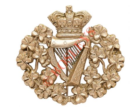 Royal Irish Regiment Victorian pagri badge. A good scarce post 1881 example. Die-stamped white metal crowned Harp resting wit