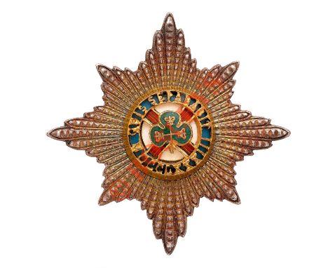 Irish Guards Officer’s forage cap badge.  A good unmarked silver example. Order of St. Patrick Star mounted with gilt and ena