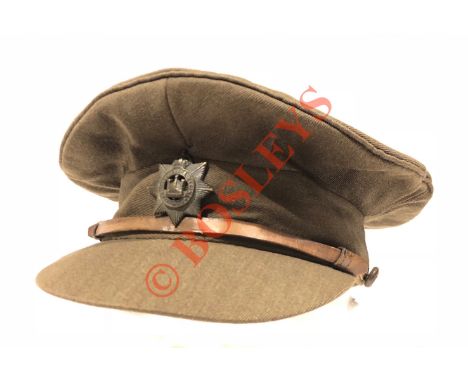 WW1 Royal Warwickshire Regiment Officer’s Cap. A good example of the Officer’s service dress cap, now fitted with a Devonshir