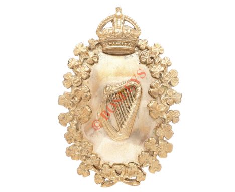 London Irish Rifles Piper’s head-dress plate circa 1908-52. A good silver plated example. Within crowned shamrock sprays, the
