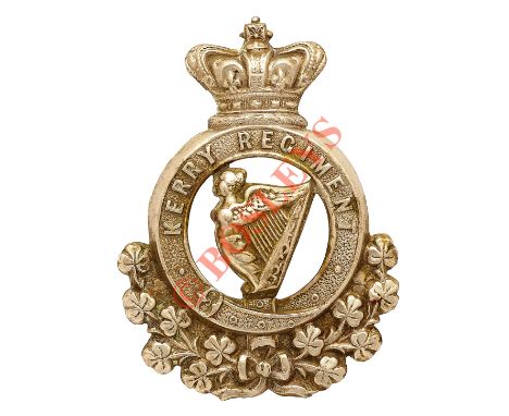 Irish. Kerry Militia Victorian OR’s glengarry badge circa 1874-81. Good scarce die-stamped white metal example. Crowned strap