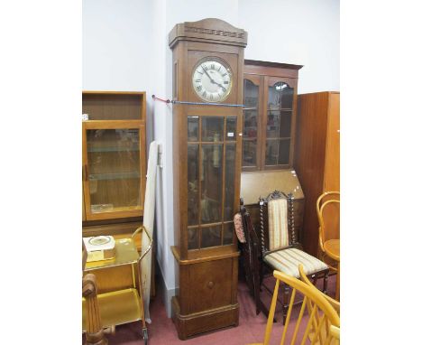 Early XX Century 8 Day Oak Longcase Clock, with a silver dial, Roman numerals, glazed door, plinth base, 310cm high.