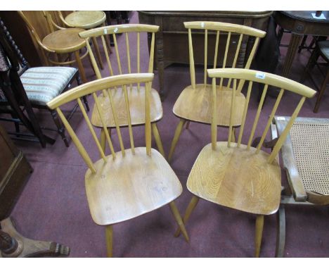 Ercol Set of Four Light Wood Comb Back Chairs, on splayed legs