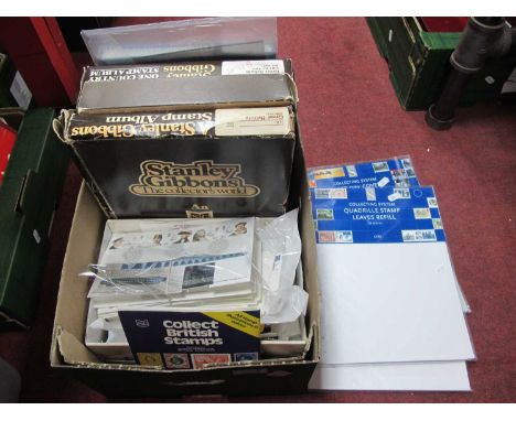 Stamps; An accumulation of World and Great Britain stamps, housed in two deluxe albums with slipcases, an S.G 'Worldex' album