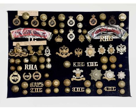 Army - Cavalry and Dragoons - 1. A display card containing cap badges, collar dogs, shoulder titles and buttons. Noted: 1st, 