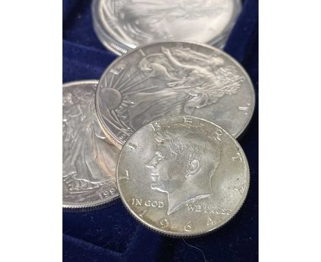 U.S.A. Silver Coins. Dollars x 7 - 1879, 1886, 1972 (40%), 1988 (Olympics), 1991, 1992 and 1993. Half dollars x 6 - 1943, 195