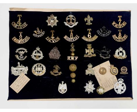 World War I Volunteer Battalions. A display card containing cap badges, collar dogs and buttons. Noted: Old Boys Corps (3rd B
