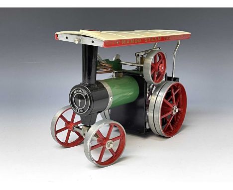 Mamod Steam Tractor. Complete in box of issue a few cellotape marks to roof - will probably clean with care.

Condition: plea