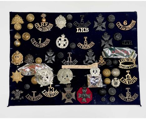 London Regiments - 2. A display card containing cap badges, collar dogs, shoulder titles and buttons. Noted: The 1st Kensingt