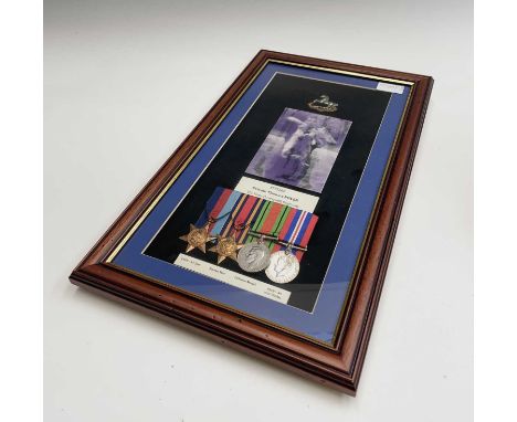 World War Two Group of 4 Medals to King's Liverpool Regiment 3775202 Private Thomas Pover. Attractively framed and glazed. Gr