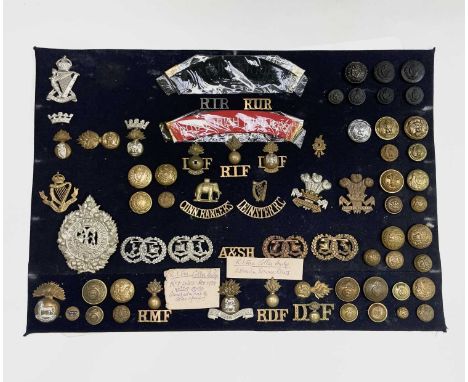 Scottish and Irish Regiments (86th to 102/103rd Foot). A display card containing cap badges, collar dogs, shoulder titles and
