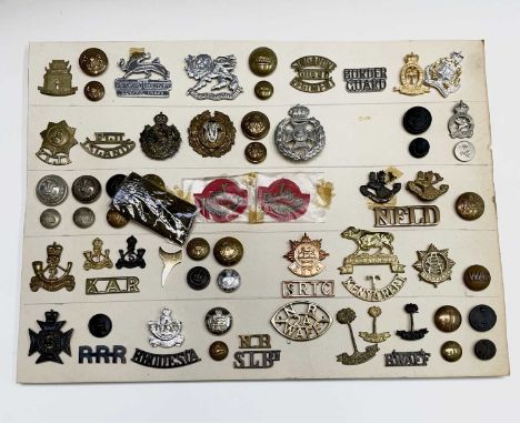 East Africa / British Colonies. A display card containing cap badges, collar dogs, shoulder titles and buttons. Includes: Hon