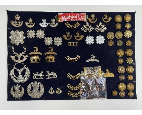 Scottish and English Regiments (68th to 79th Foot). A display card containing cap badges, collar dogs, shoulder titles and bu