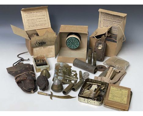 Miscellaneous Military. Lot comprises three boxes. Noted: Various shellcases, de-activated hand grenade, leather gun holster,